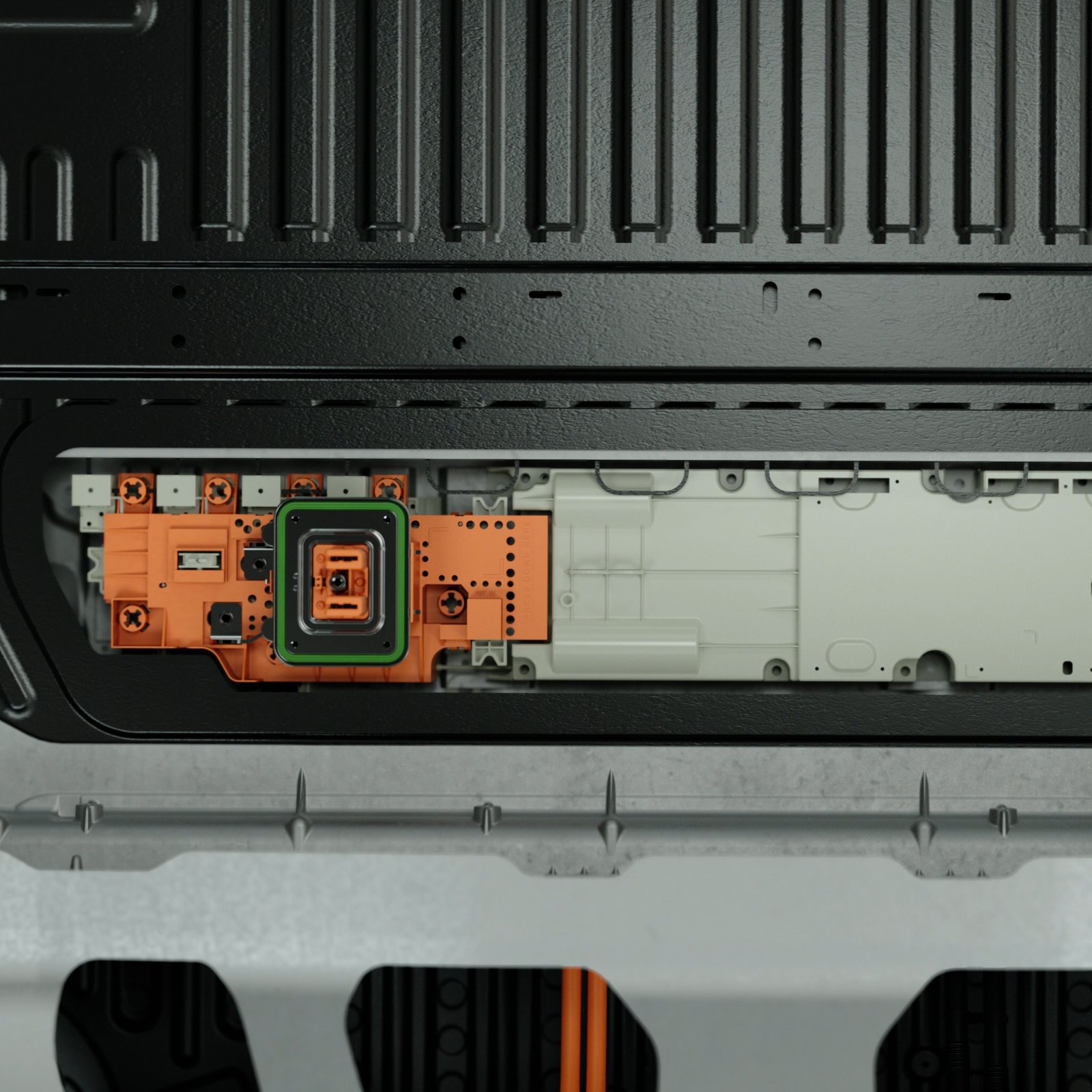 Ford’s ‘E-box’ combines the DC-to-DC converter and the AC charger into one serviceable module.